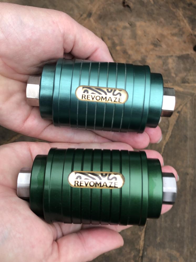 Emerald (the darker one) and the other one is the first run of Green V1